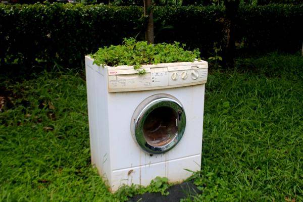 old broken washing machine appliance recycling