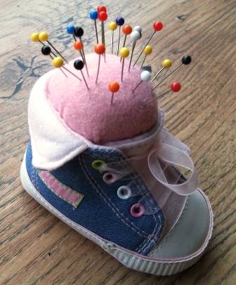 Baby shoe pin cushion