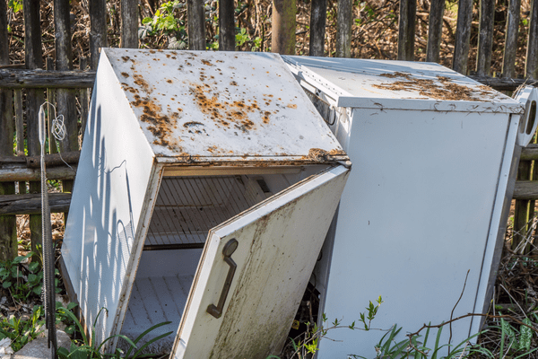 Old broken fridge