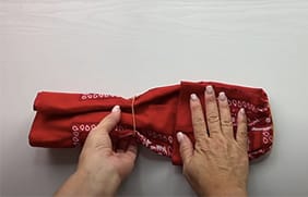 Step-4-turning-the-bandana-over-and-folding-it-again