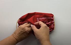 Step-5-tucking-in-the-loose-ends-of-the-cloth